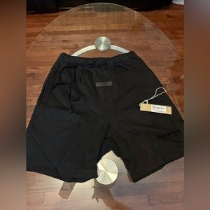 Black essentials fear of god shorts